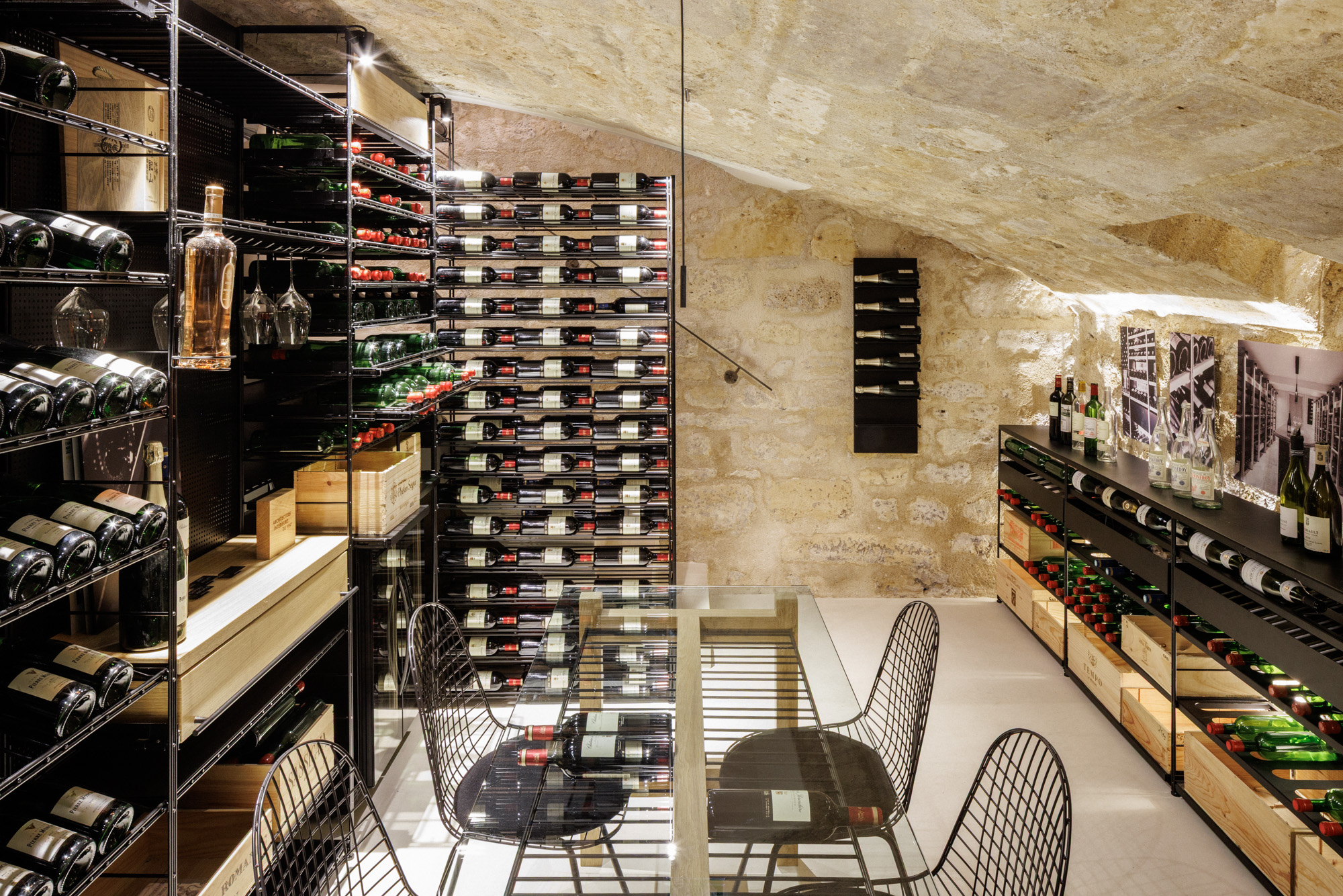 Vaulted wine cellar furnished by Architecture Intérieure du Vin