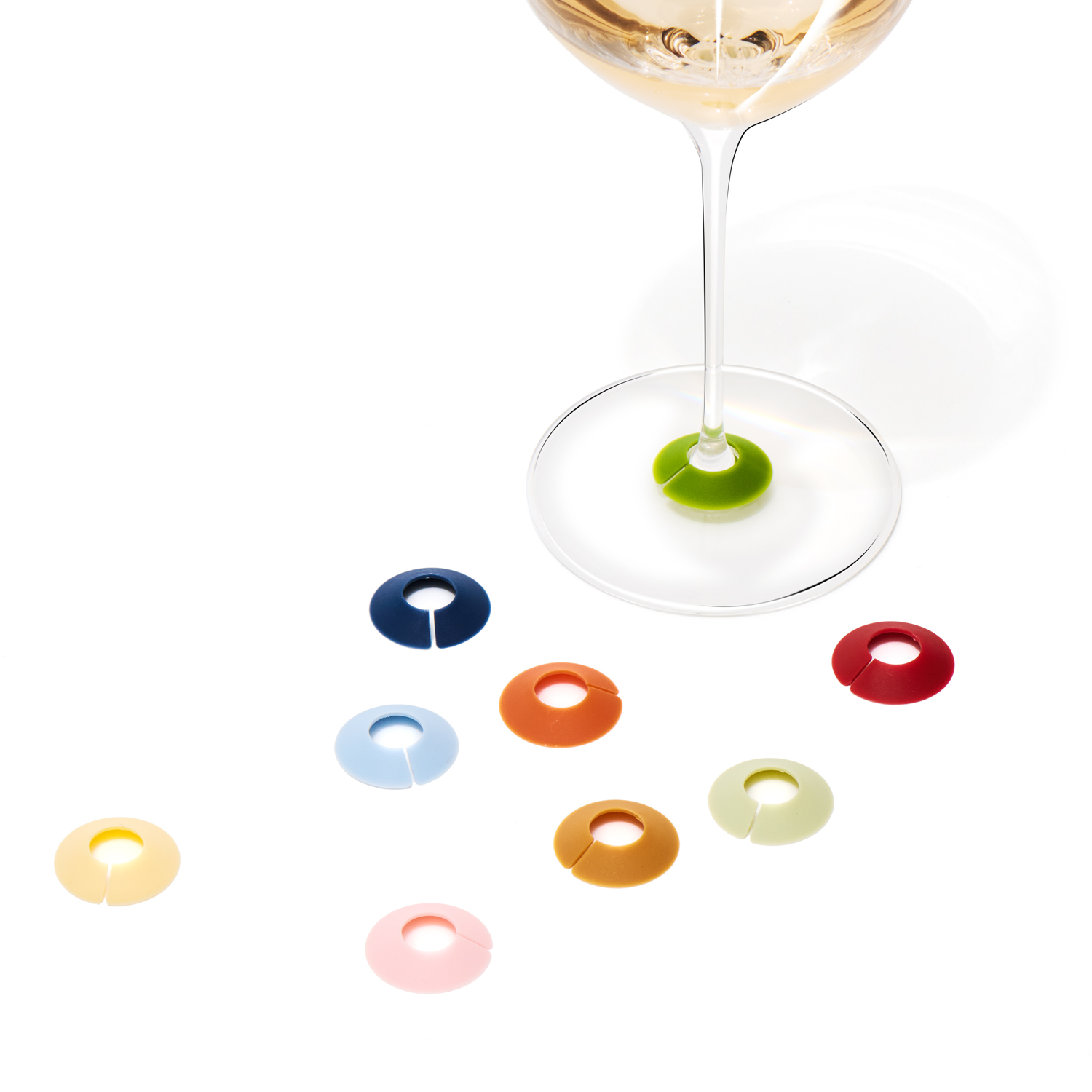 Chic Glass Rainbow wine glass markers by L’Atelier du Vin, set of nine colorful silicone markers designed to easily identify wine glasses during wine tastings, dinner parties, and entertaining.