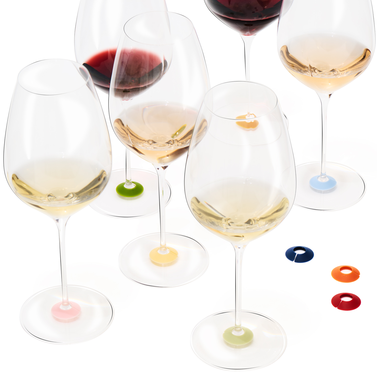 Wine glasses fitted with Chic Glass Rainbow wine glass markers by L’Atelier du Vin, a colorful and practical solution for distinguishing each guest’s glass at the table.