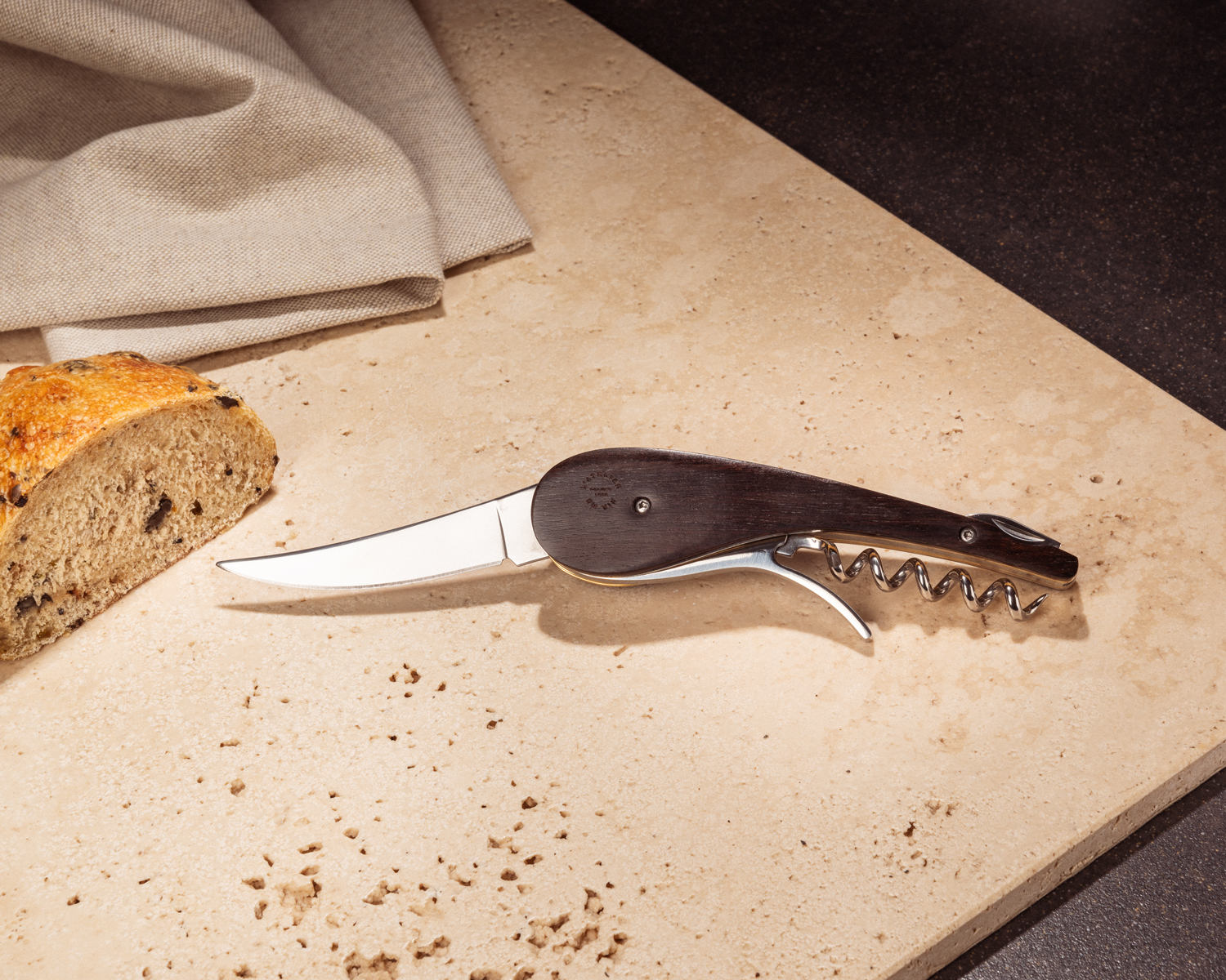 Sommelier corkscrew with folding knife