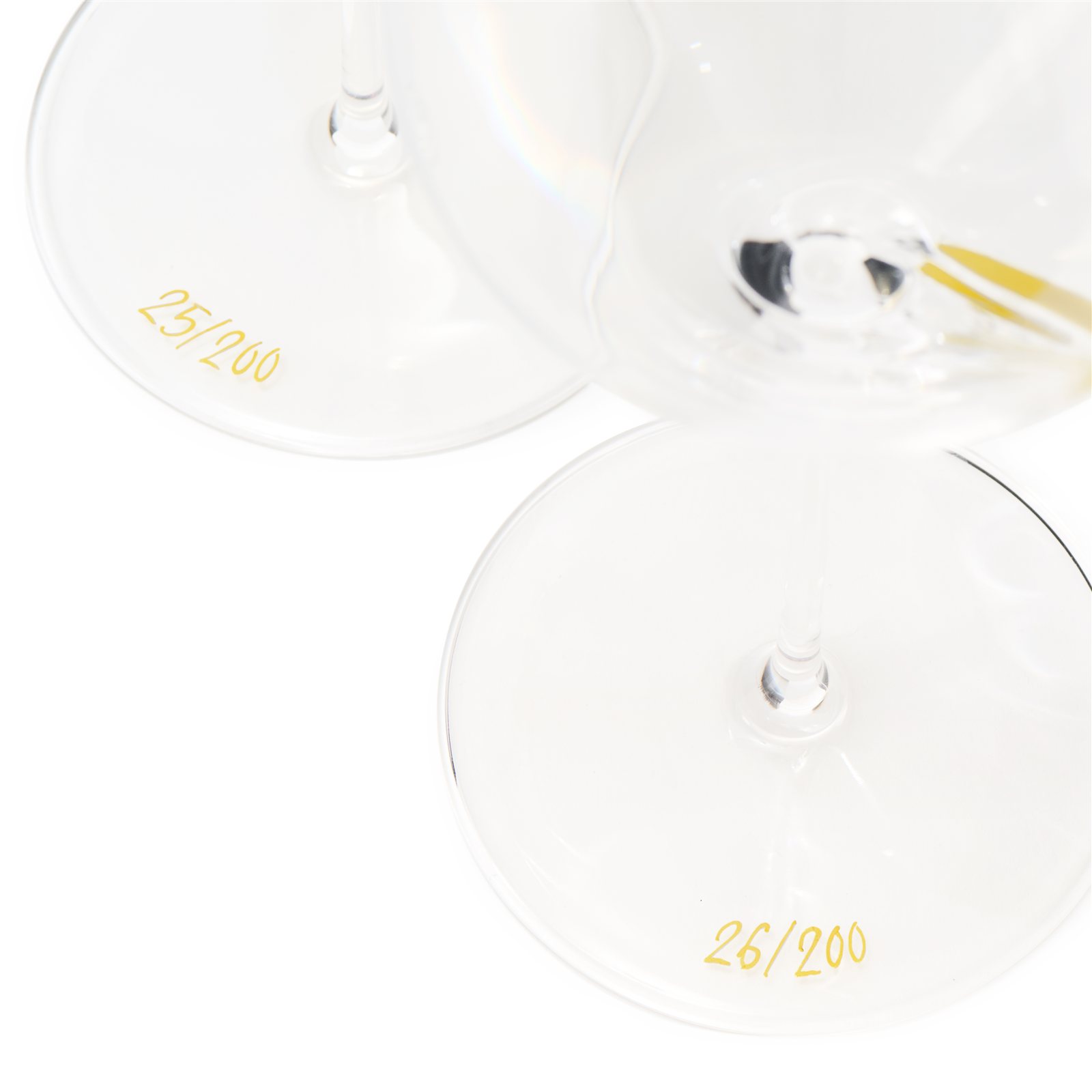 Close-up of the individually numbered bases of Exploreur 655 Aroma Line Centenary Edition wine glasses